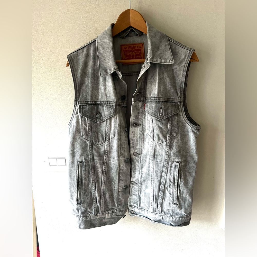 Sleeveless acid wash denim vest